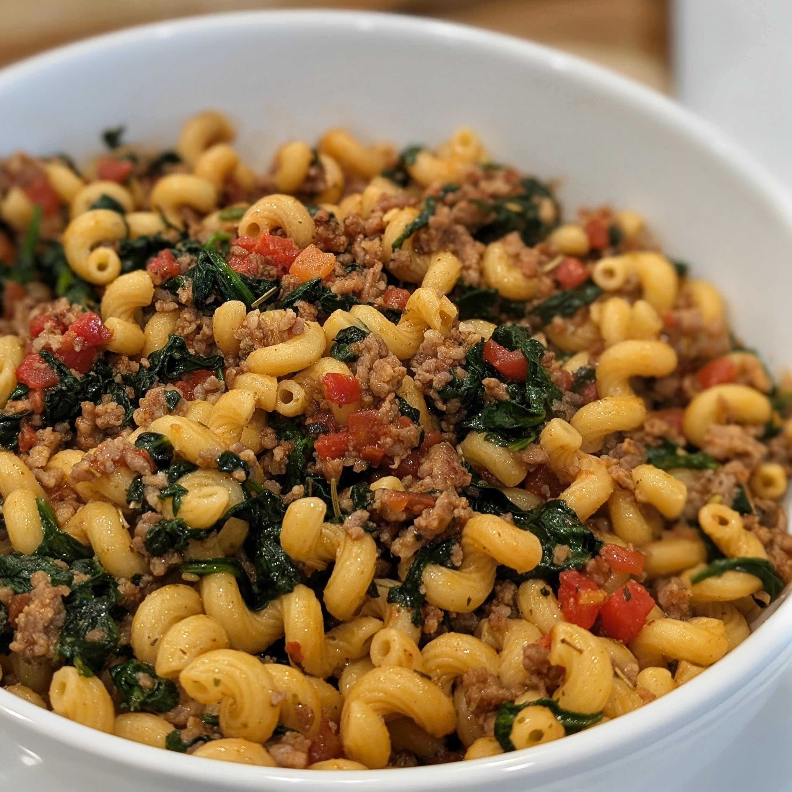 Quick Italian Sausage Pasta with Spinach and Tomatoes